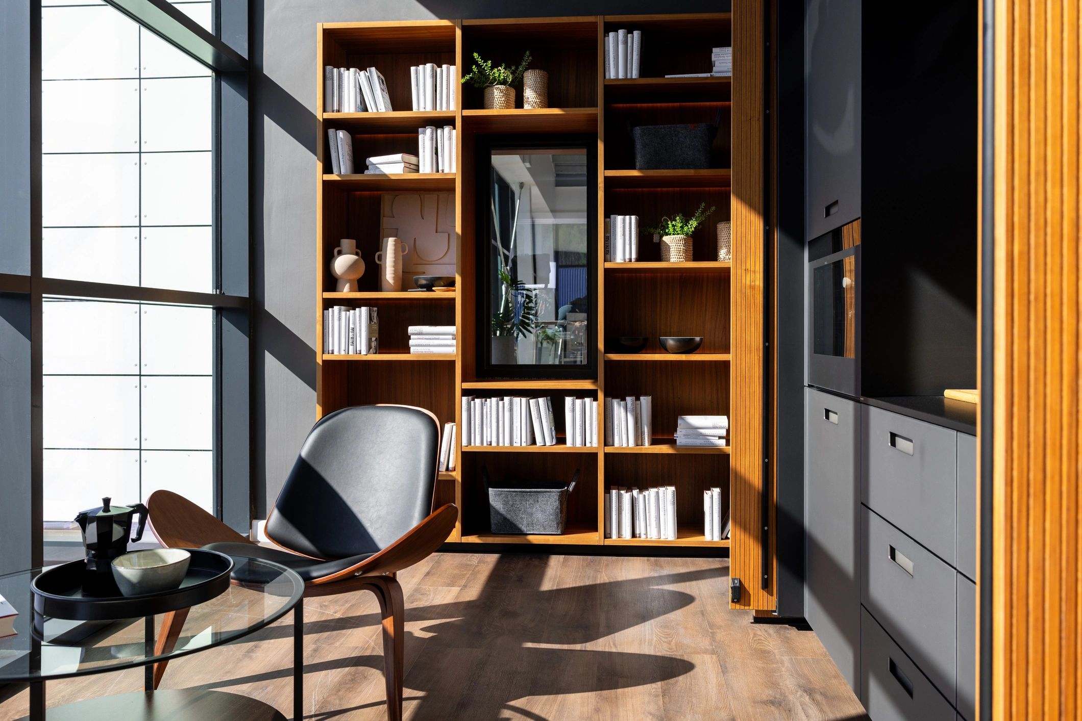 Publishing office with bookshelves and meeting space